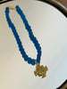 Glass Necklace w/ St. Ben
